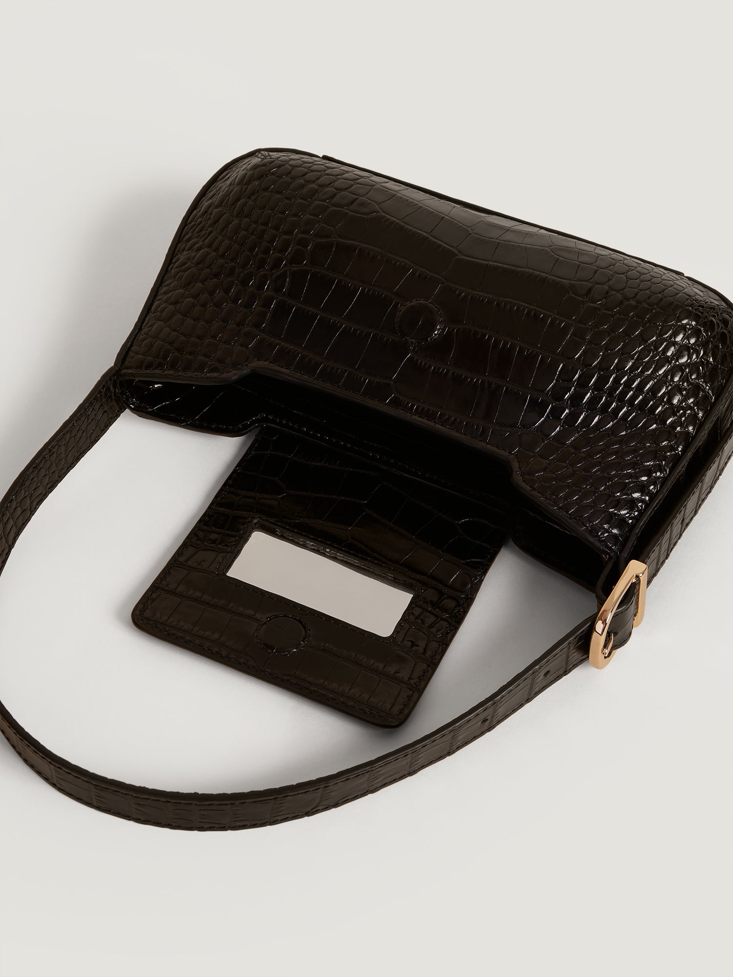 Baguette bag in black croco like leather Rouje